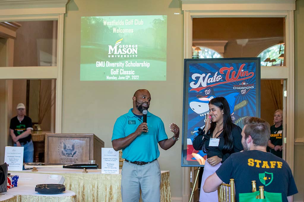 EIP Director Davis introduces EIP student Brenda Leverson who spoke at the Golf Classic luncheon. Photo by Sierra Guard/Creative Services
