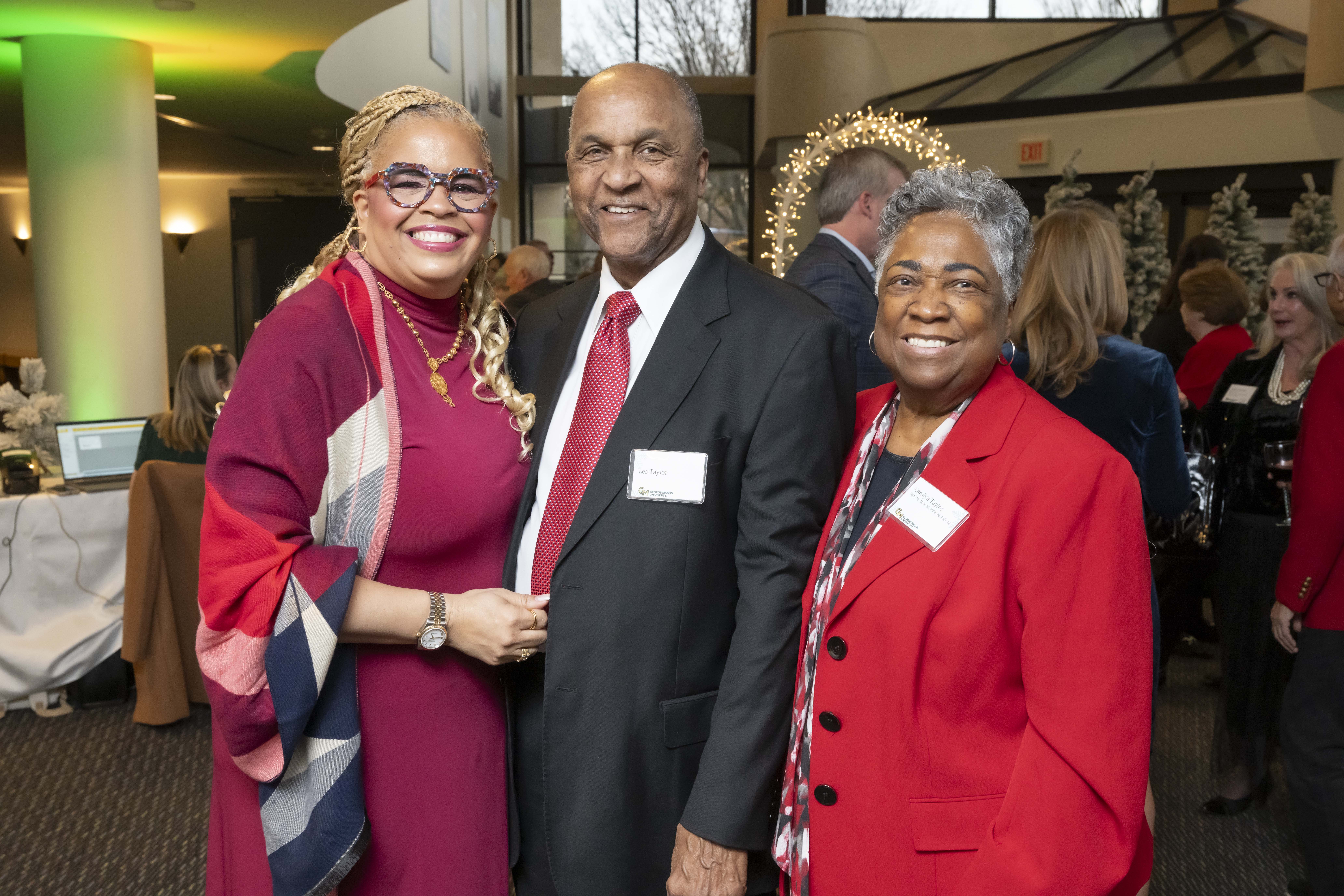 Three 2024 Winter Celebration of Giving reception attendees.