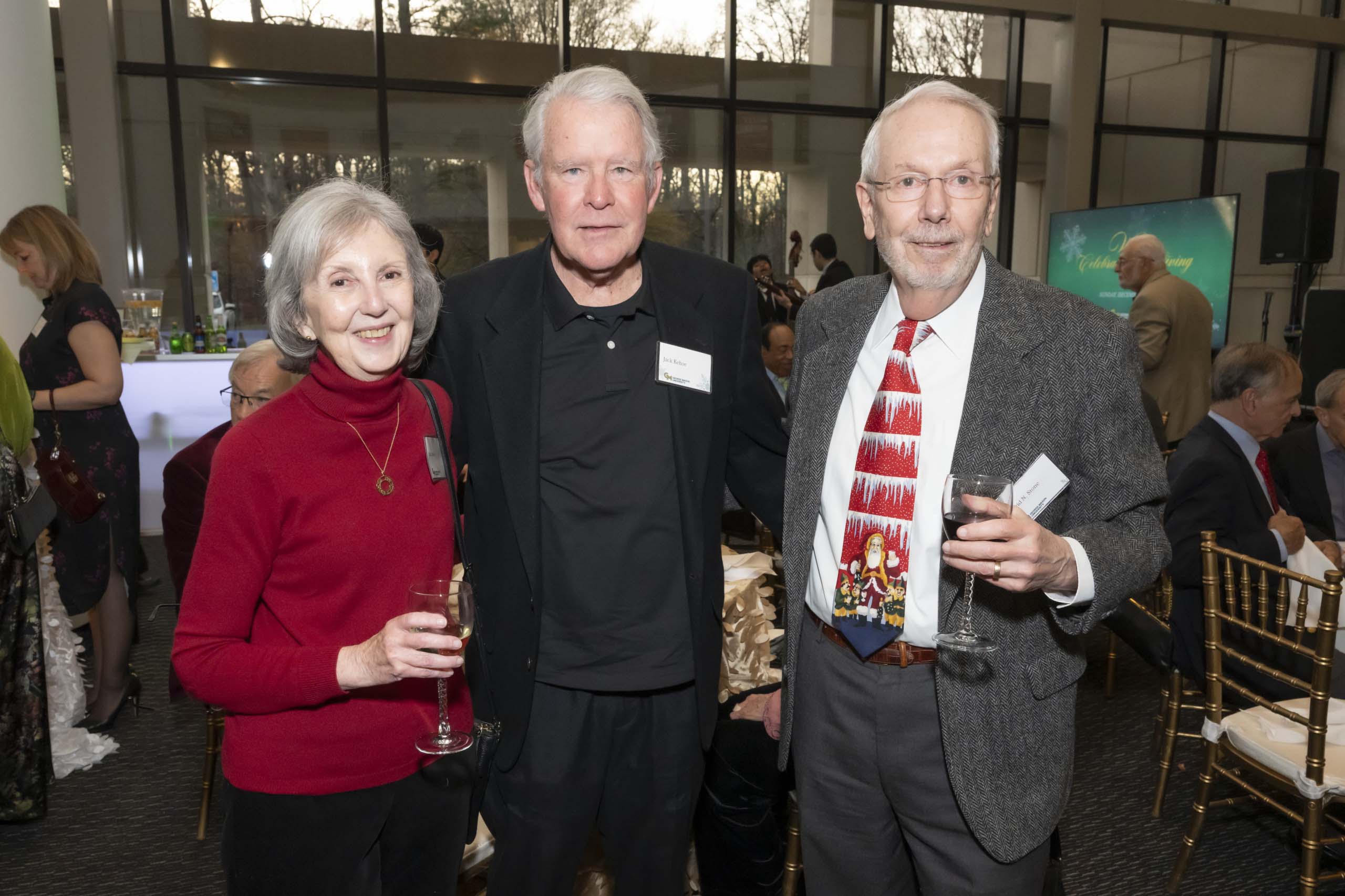 Three 2024 Winter Celebration of Giving reception attendees.