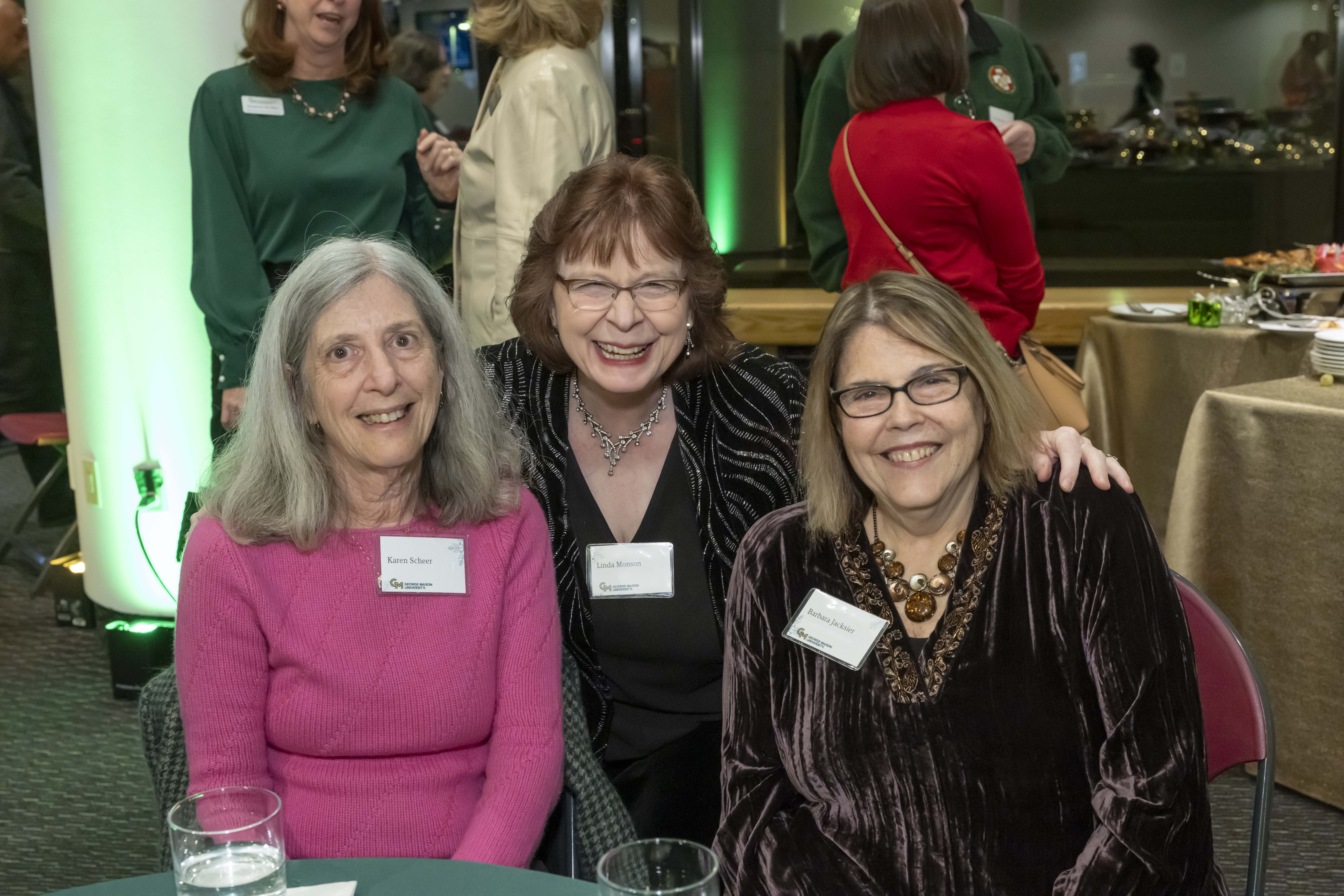 Three 2024 Winter Celebration of Giving reception attendees.