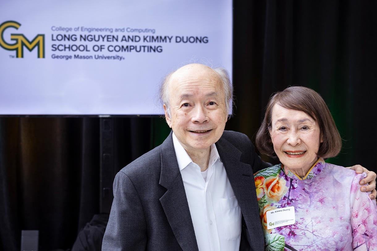 Smiling Long Nguyen and Kimmy Duong posing for photo