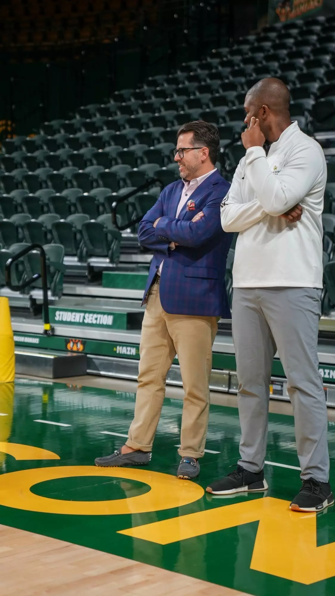 Matt Vahue and Assistant VP and Director of Athletics Marvin Lewis