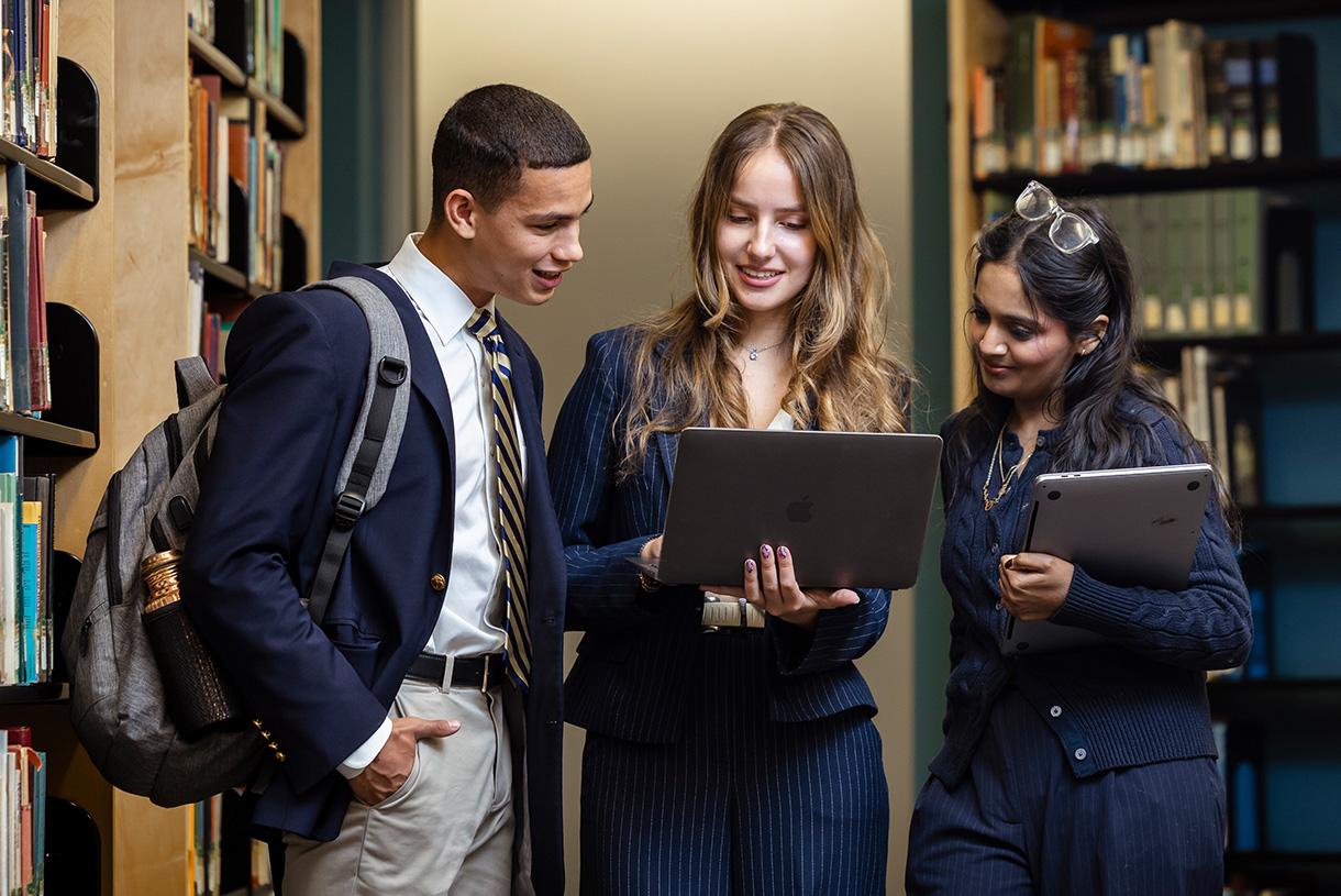 Three students in the library