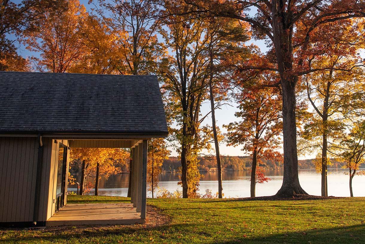 Cabin by the lake during sunset