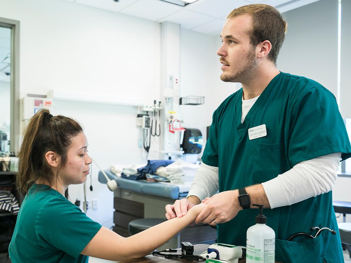 Two nursing students in the lab
