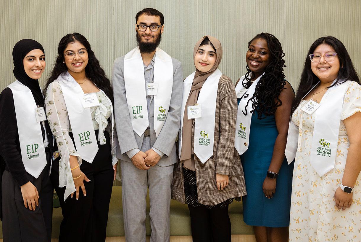 Six students standing together and wearing EIP sashes
