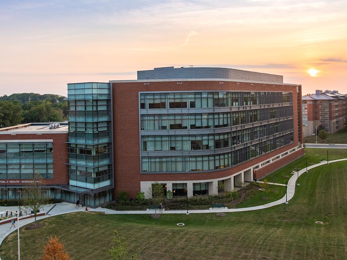 Brick and glass building during sunset