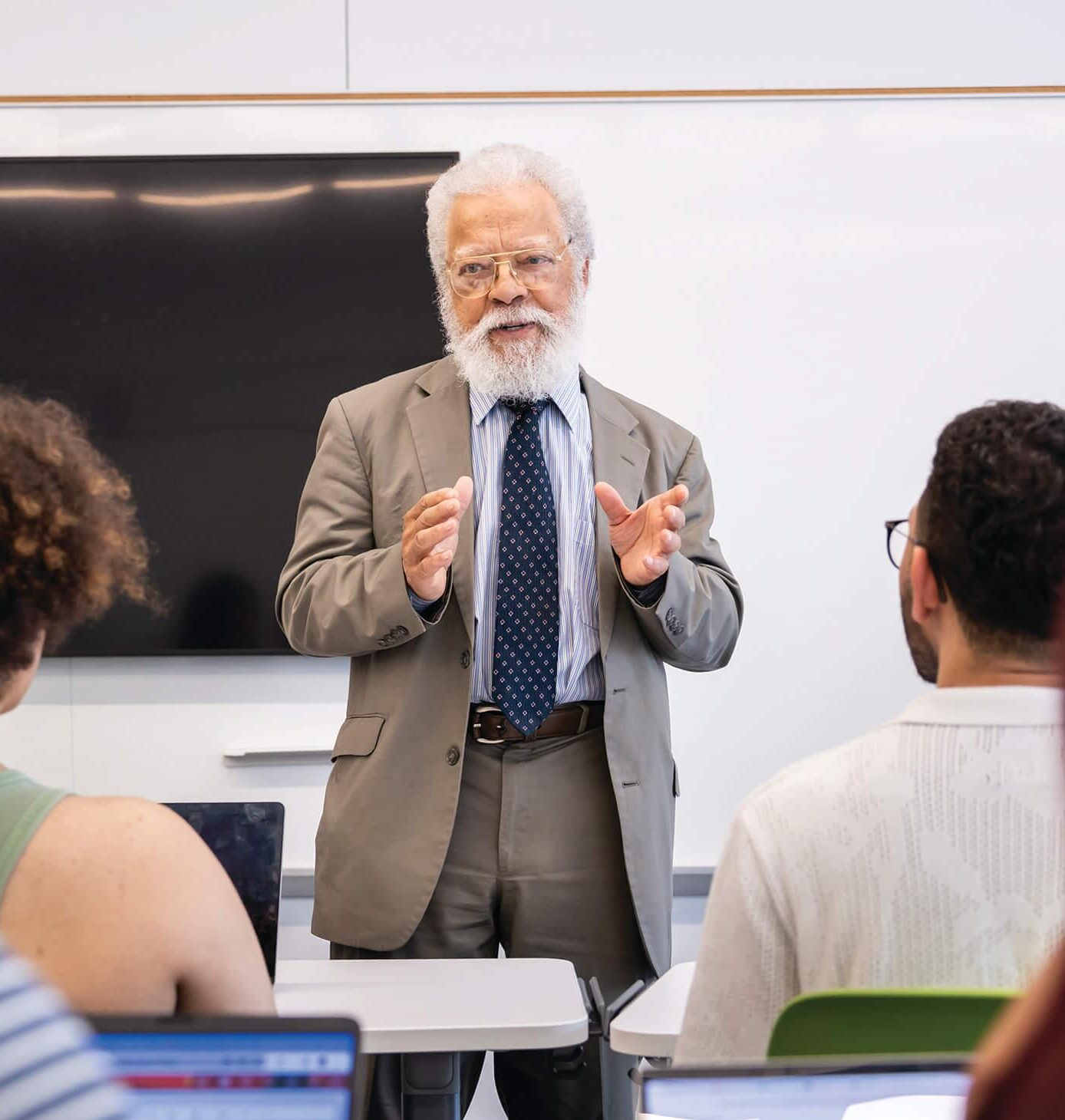 Faculty at the front of a classroom with students