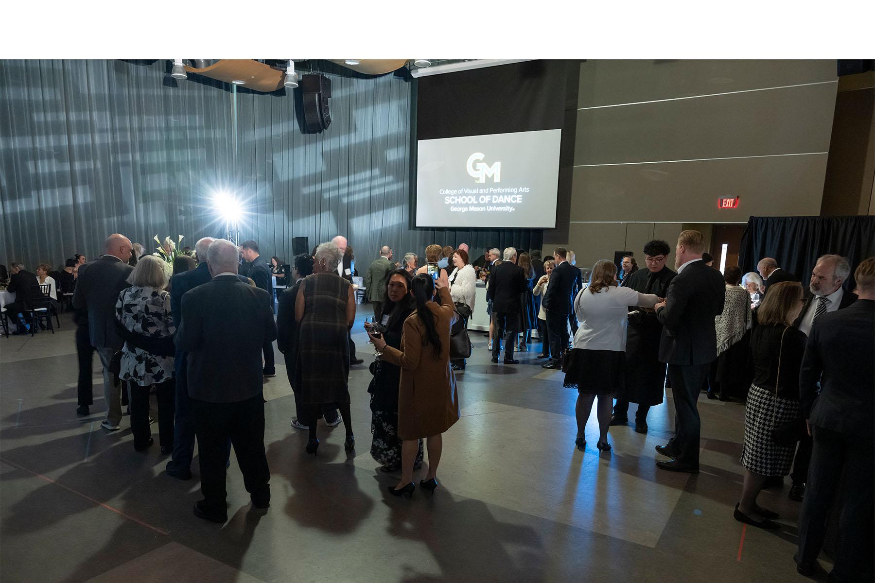 Reception space filled with event attendees.