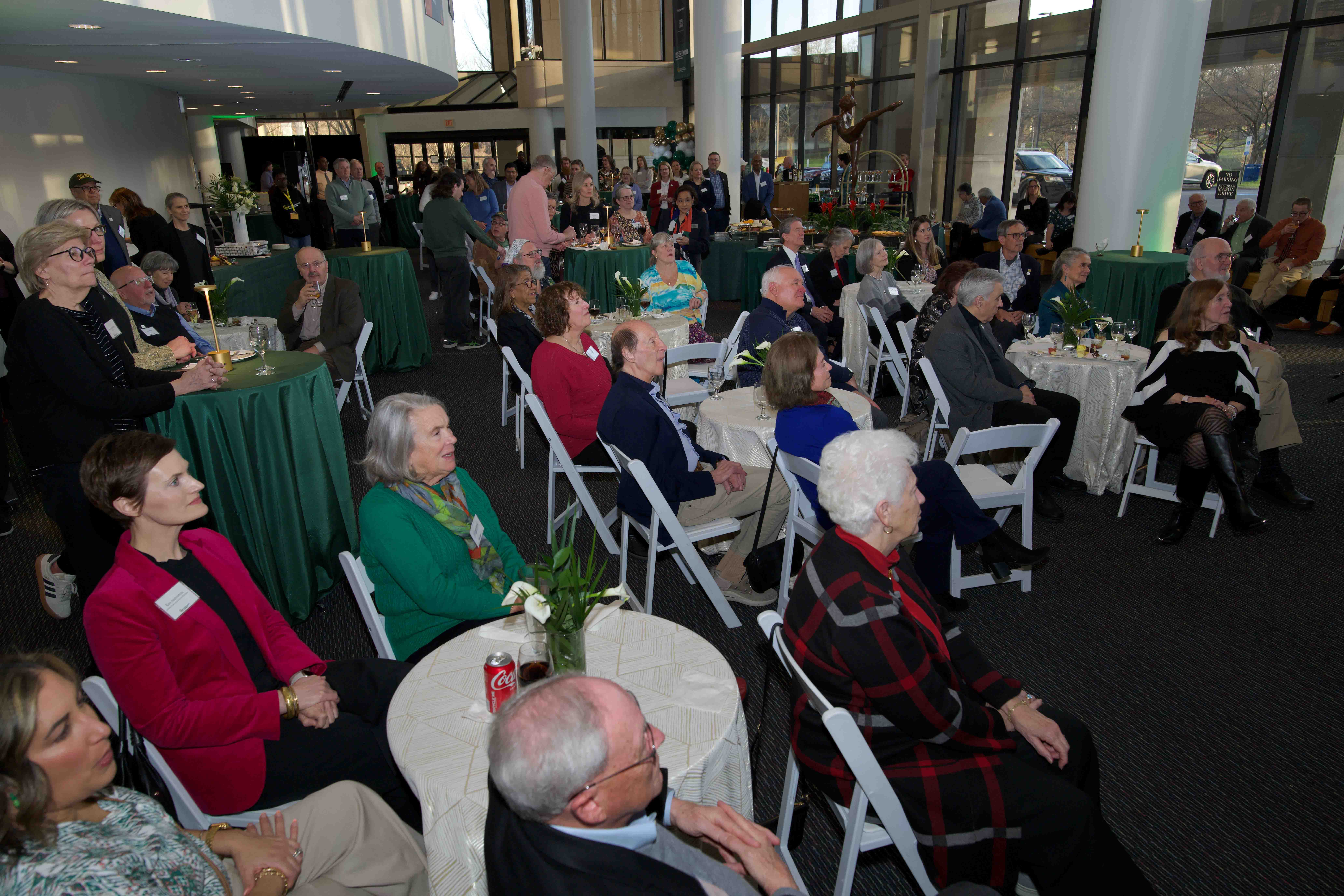 Celebrating Our Champions event attendees seated at tables.