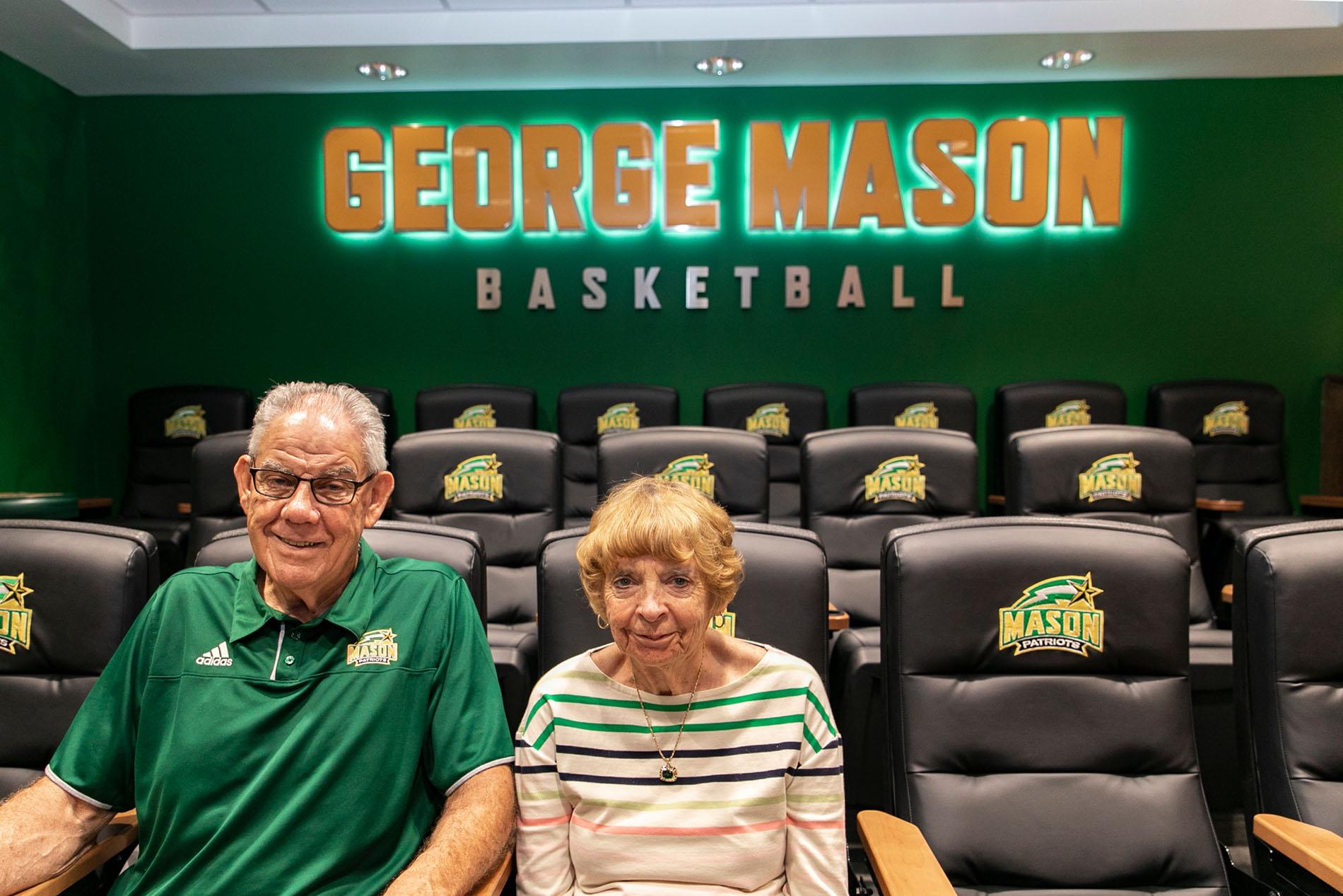Jay and Carolyn Marsh seated in the men’s basketball film room.